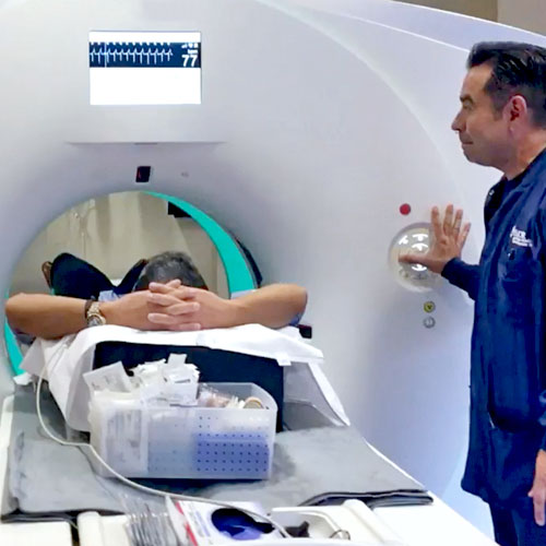 Patient undergoing CT scan to determine cardiac calcium score
